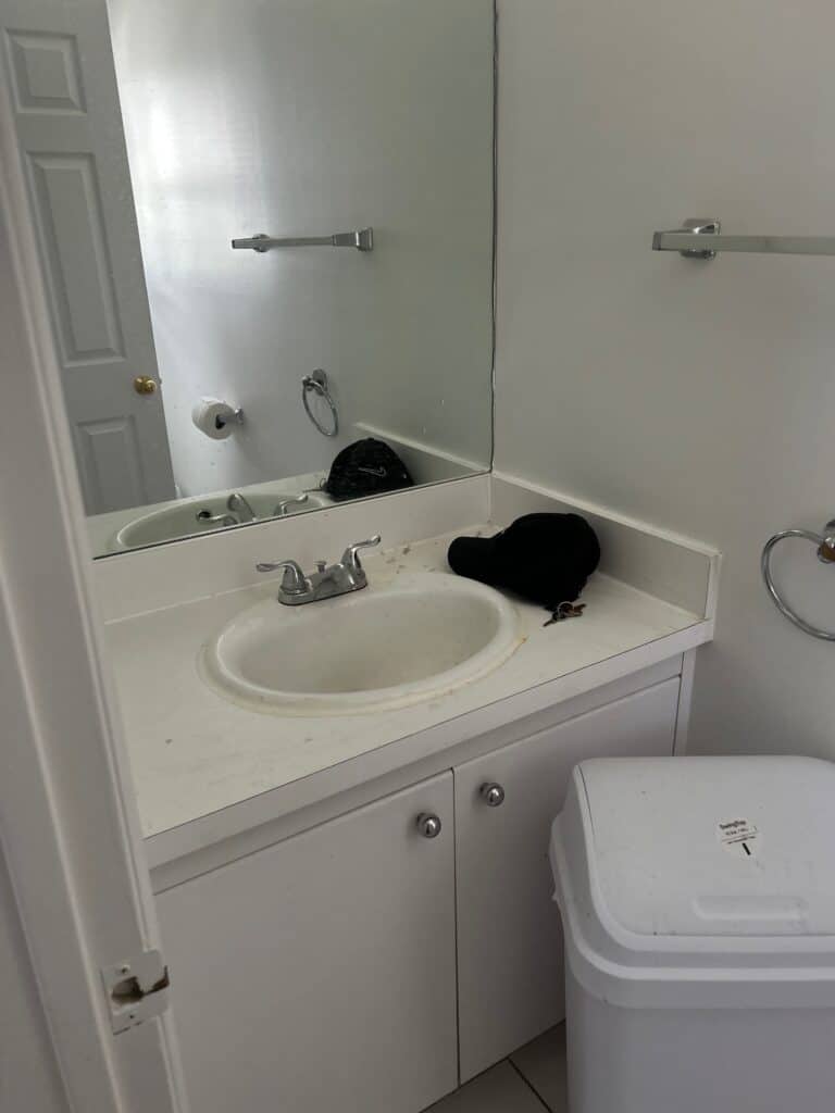NJ bathroom vanity remodel before and‑after floating cabinet renovation
